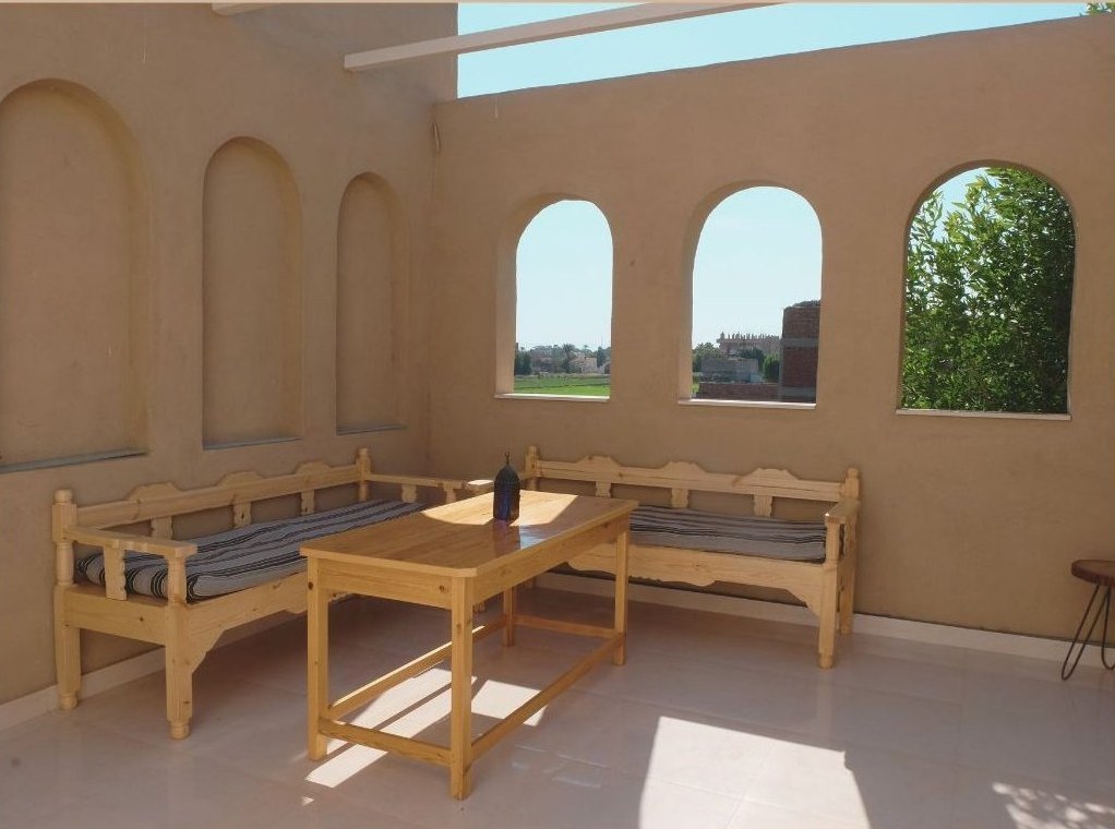 Wooden bench seating with mountain views