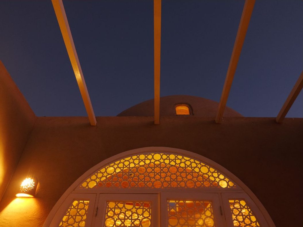Ornate double doors opening to the terrace