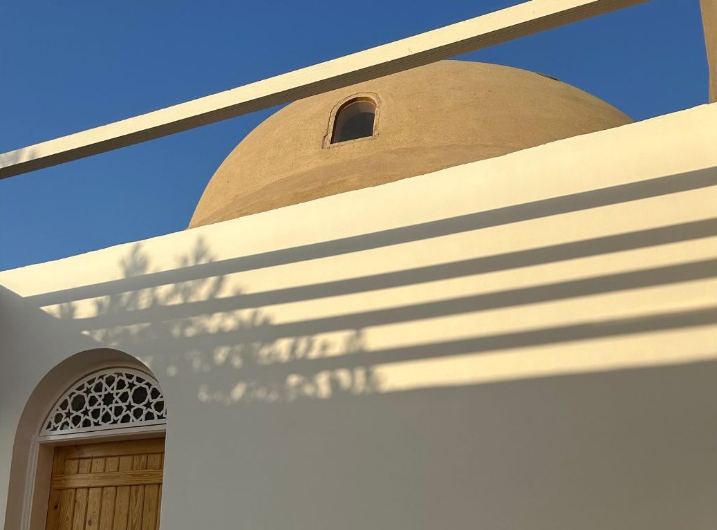 Sunlit Nubian dome and archway detail